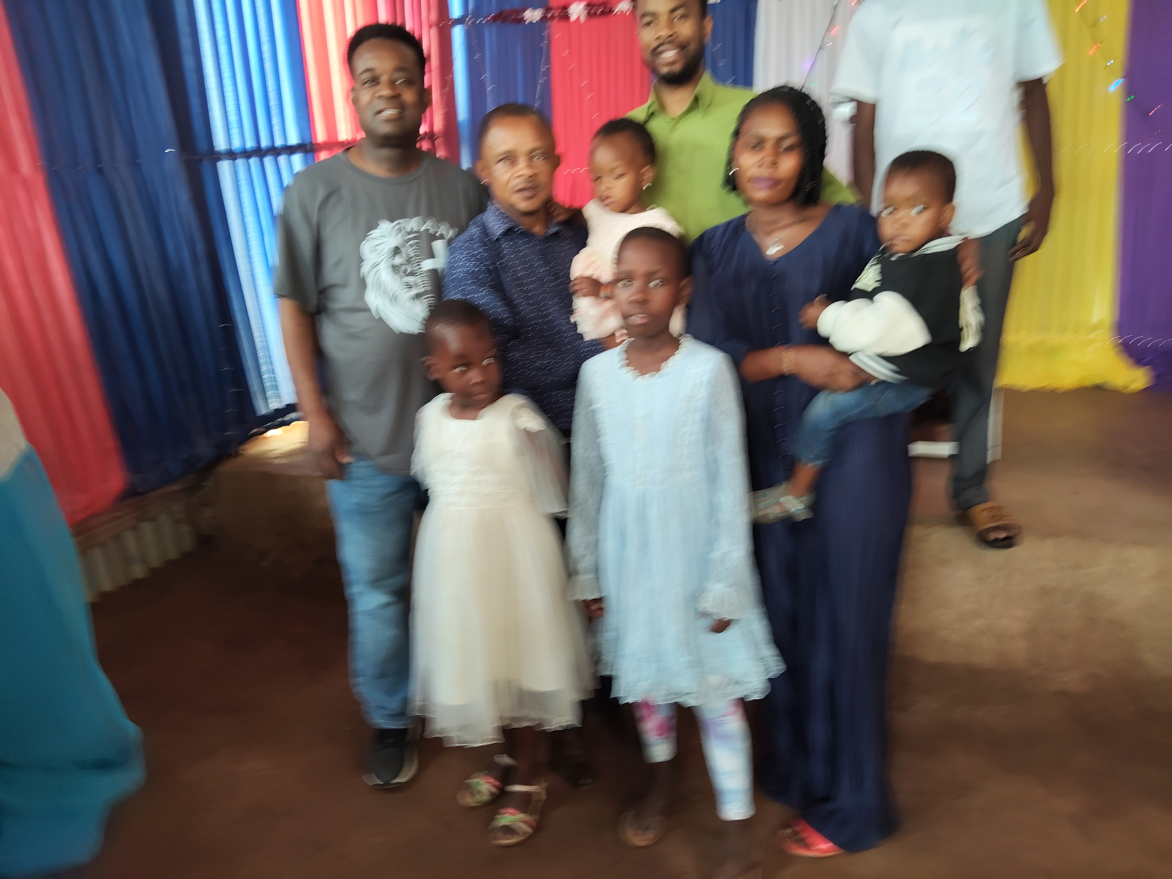 With our Host Pastor John Kisubi and Family